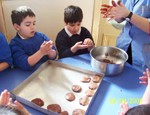 Cooking chocolate biscuits.