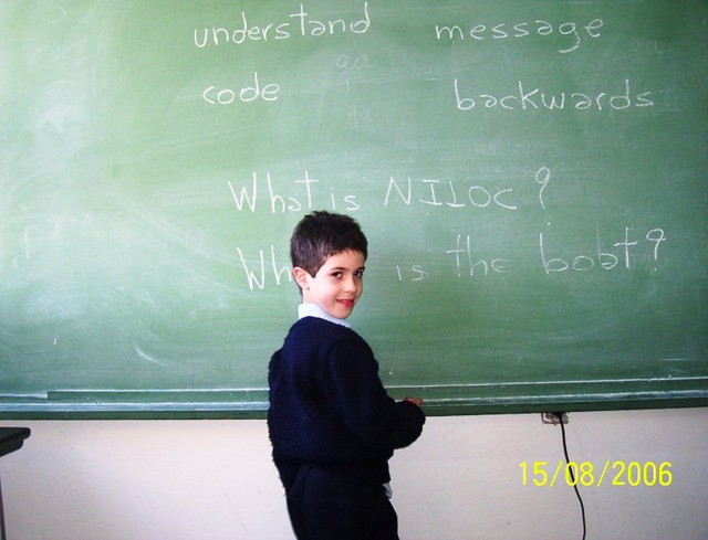 Juan Manuel answering a question on the board.